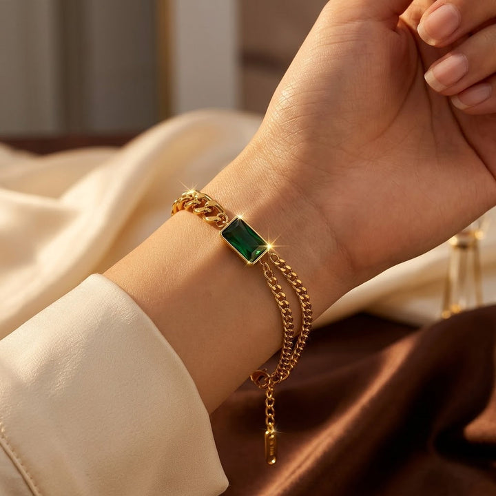 Bracelet à maillons en or et émeraude